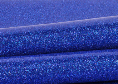 中国 布の底が付いている青いポリ塩化ビニールのきらめきの生地、特別な織物の革輝きのきらめきの生地 工場